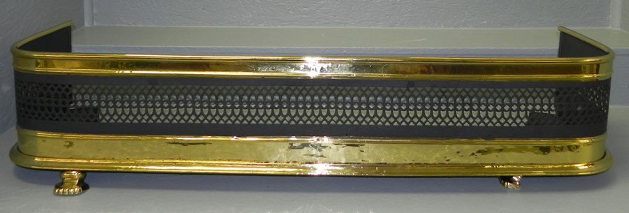 Brass and iron antique fender. 43" long.: Brass and iron antique fender. 43" long.