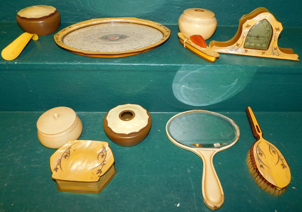 Lot of Bakelite Dresser Items: Lot of Bakelite Dresser Items. ALL DESCRIPTIONS AND ANY CONDITION STATEMENT GIVEN BY LANGSTON AUCTION GALLERY ARE STRICTLY OPINIONS AND LANGSTON'S SHALL HAVE NO RESPONSIBILITY FOR ERRORS OR OMISSIONS.