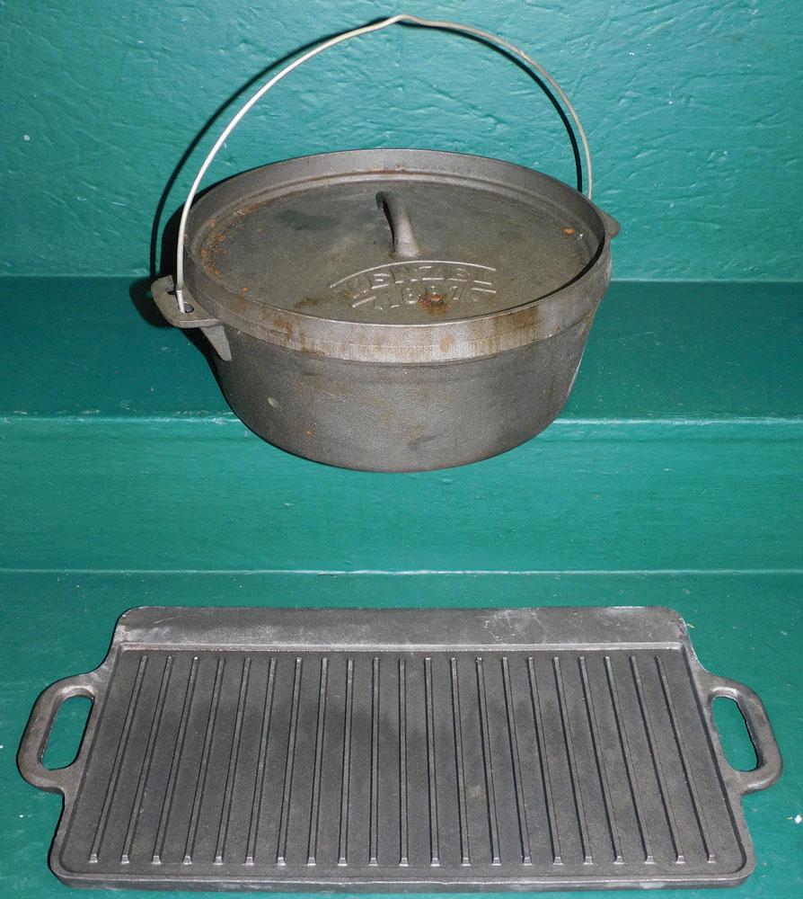 Wenzel Cast Iron Dutch Oven & Skillet: Wenzel Cast Iron Dutch Oven & Skillet. 20" W ALL DESCRIPTIONS AND ANY CONDITION STATEMENT GIVEN BY LANGSTON AUCTION GALLERY ARE STRICTLY OPINIONS AND LANGSTON'S SHALL HAVE NO RESPONSIBILITY FOR ERRORS