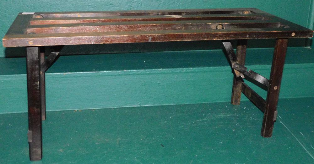 Walnut Folding Bench: Walnut Folding Bench. 34" W 15 1/4" D 14 3/4" H ALL DESCRIPTIONS AND ANY CONDITION STATEMENT GIVEN BY LANGSTON AUCTION GALLERY ARE STRICTLY OPINIONS AND LANGSTON'S SHALL HAVE NO RESPONSIBILITY FOR ERR