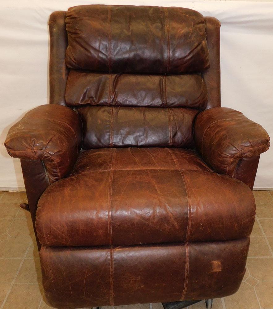 Leather Recliner ( As Is): Leather Recliner ( As Is). 38" H ALL DESCRIPTIONS AND ANY CONDITION STATEMENT GIVEN BY LANGSTON AUCTION GALLERY ARE STRICTLY OPINIONS AND LANGSTON'S SHALL HAVE NO RESPONSIBILITY FOR ERRORS OR OMISSION