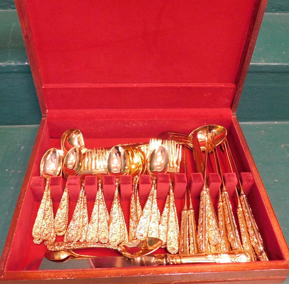 Lot Gold Wash Godinger Flatware in Case: Lot Gold Wash Godinger Flatware in Case. Case: 15" W 11 1/2" D 3" H ALL DESCRIPTIONS AND ANY CONDITION STATEMENT GIVEN BY LANGSTON AUCTION GALLERY ARE STRICTLY OPINIONS AND LANGSTON'S SHALL HAVE NO RE