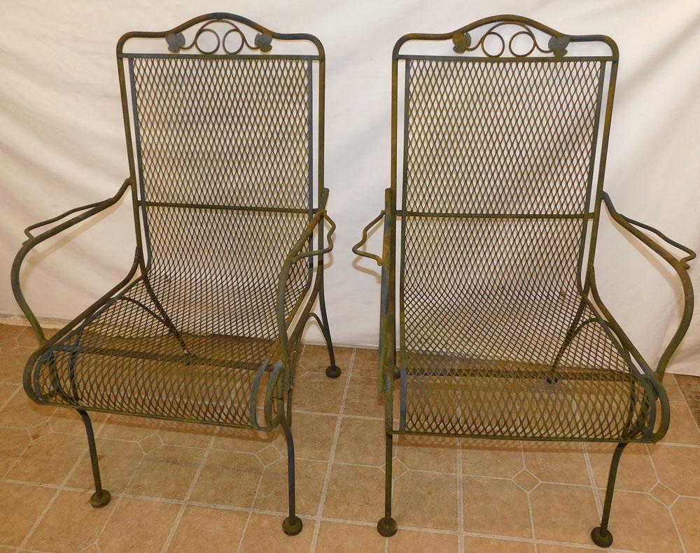 Pair Wrought Iron Outdoor Arm Chairs: Pair Wrought Iron Outdoor Arm Chairs. 36 1/2" H ALL DESCRIPTIONS AND ANY CONDITION STATEMENT GIVEN BY LANGSTON AUCTION GALLERY ARE STRICTLY OPINIONS AND LANGSTON'S SHALL HAVE NO RESPONSIBILITY FOR ERR