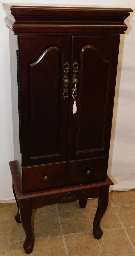 Mahogany Jewelry Cabinet: Mahogany Jewelry Cabinet. 16 1/2" W 11 1/2" D 40" H ALL DESCRIPTIONS AND ANY CONDITION STATEMENT GIVEN BY LANGSTON AUCTION GALLERY ARE STRICTLY OPINIONS AND LANGSTON'S SHALL HAVE NO RESPONSIBILITY FOR