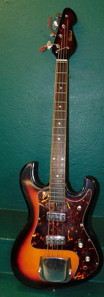 Vintage Electric Base Guitar: Vintage Electric Base Guitar . 42 1/2" L ALL DESCRIPTIONS AND ANY CONDITION STATEMENT GIVEN BY LANGSTON AUCTION GALLERY ARE STRICTLY OPINIONS AND LANGSTON'S SHALL HAVE NO RESPONSIBILITY FOR ERRORS OR 