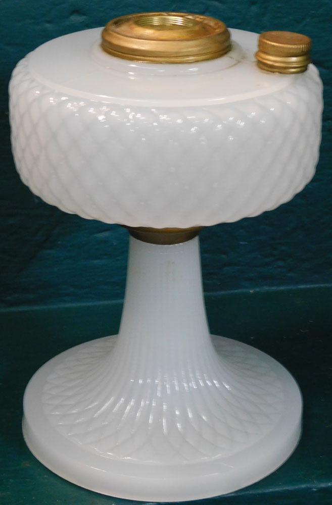 Antique Aladdin White Moonstone Diamond Quilted Oil Lamp Base: Antique Aladdin White Moonstone Diamond Quilted Oil Lamp Base. 9" H ALL DESCRIPTIONS AND ANY CONDITION STATEMENT GIVEN BY LANGSTON AUCTION GALLERY ARE STRICTLY OPINIONS AND LANGSTON'S SHALL HAVE NO RE