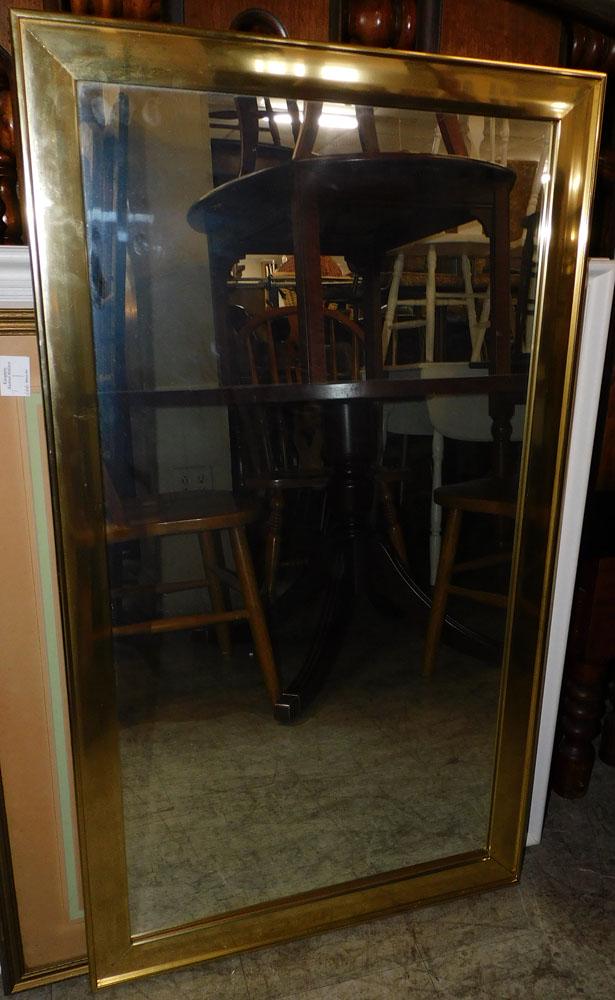 Brass Framed Mirror: Brass Framed Mirror . 23 1/2" x 41 3/4" ALL DESCRIPTIONS AND ANY CONDITION STATEMENT GIVEN BY LANGSTON AUCTION GALLERY ARE STRICTLY OPINIONS AND LANGSTON'S SHALL HAVE NO RESPONSIBILITY FOR ERRORS OR O