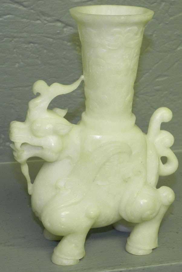 Carved soapstone Foo Dog vase. 7 1/2" h.: Carved soapstone Foo Dog vase. 7 1/2" h.