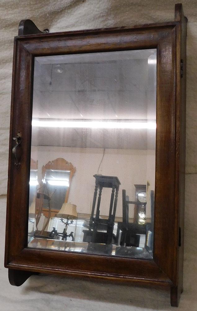 Antique Walnut Medicine Cabinet with Bevel Edge Mirror: Antique Walnut Medicine Cabinet with Bevel Edge Mirror. 15 3/4" x 27" ALL DESCRIPTIONS AND ANY CONDITION STATEMENT GIVEN BY LANGSTON AUCTION GALLERY ARE STRICTLY OPINIONS AND LANGSTON'S SHALL HAVE NO 