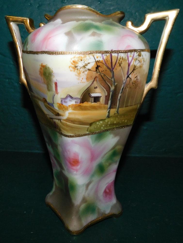 Paint Decorated Porcelain Vase by Nippon: Paint Decorated Porcelain Vase by Nippon. 8 1/4" H ALL DESCRIPTIONS AND ANY CONDITION STATEMENT GIVEN BY LANGSTON AUCTION GALLERY ARE STRICTLY OPINIONS AND LANGSTON'S SHALL HAVE NO RESPONSIBILITY FOR 