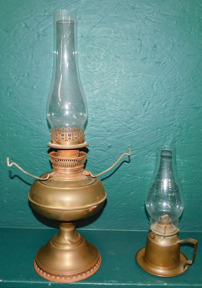 Two Antique Brass Oil Lamps: Two Antique Brass Oil Lamps. Up to 22" H ALL DESCRIPTIONS AND ANY CONDITION STATEMENT GIVEN BY LANGSTON AUCTION GALLERY ARE STRICTLY OPINIONS AND LANGSTON'S SHALL HAVE NO RESPONSIBILITY FOR ERRORS OR 