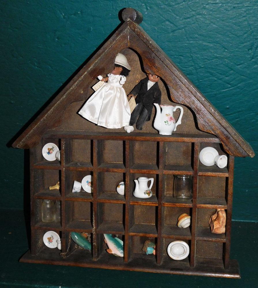 Painted Wall What Knot Shelf with Collectible Miniatures (1 of 2)