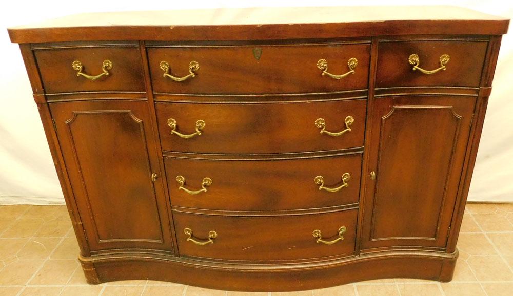 Mahogany Serpentine Front Sideboard: Mahogany Serpentine Front Sideboard. 54 1/4" W 21" D 35 1/2" H ALL DESCRIPTIONS AND ANY CONDITION STATEMENT GIVEN BY LANGSTON AUCTION GALLERY ARE STRICTLY OPINIONS AND LANGSTON'S SHALL HAVE NO RESPONS