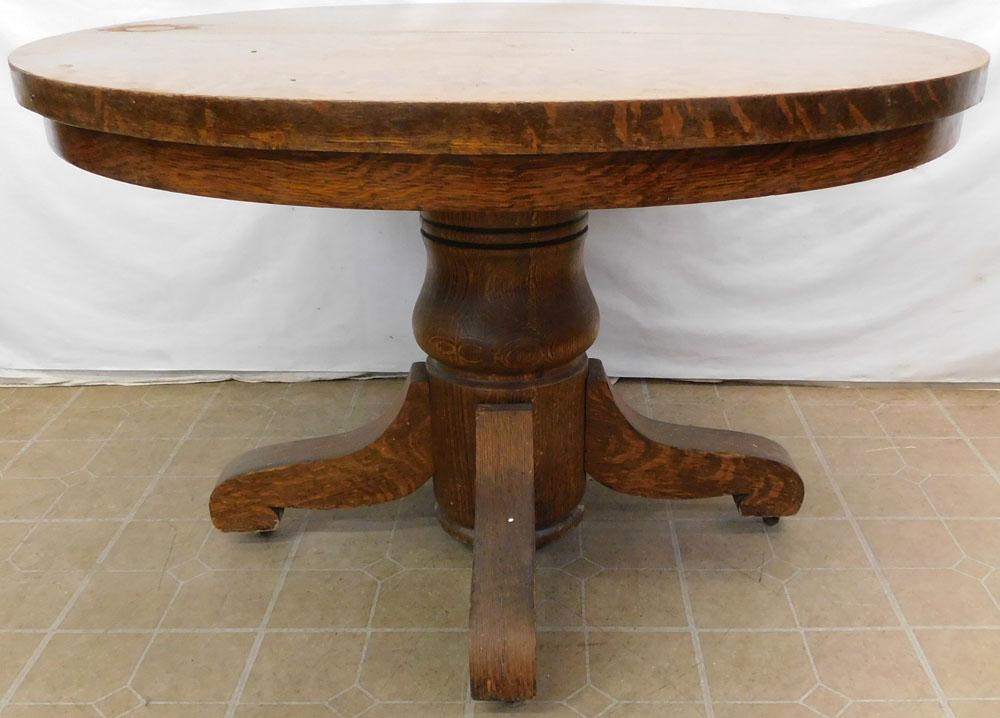Quarter Saw Oak Dining Table: Quarter Saw Oak Dining Table . 42 1/4" Dia. 31" H ALL DESCRIPTIONS AND ANY CONDITION STATEMENT GIVEN BY LANGSTON AUCTION GALLERY ARE STRICTLY OPINIONS AND LANGSTON'S SHALL HAVE NO RESPONSIBILITY FOR E