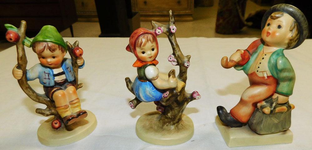 3 Hummel Figurines: 3 Hummel Figurines . 4" H "ALL DESCRIPTIONS AND ANY CONDITION STATEMENT GIVEN BY LANGSTON AUCTION GALLERY ARE STRICTLY OPINIONS AND LANGSTON'S SHALL HAVE NO RESPONSIBILITY FOR ERRORS OR OMISSIONS. THE