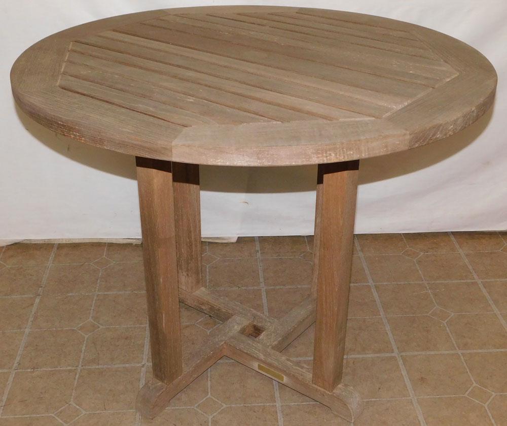 Teakwood Outdoor Table by Kingsley-Bate: Teakwood Outdoor Table by Kingsley-Bate. 36 1/4" Dia 28 3/4" H ALL DESCRIPTIONS AND ANY CONDITION STATEMENT GIVEN BY LANGSTON AUCTION GALLERY ARE STRICTLY OPINIONS AND LANGSTON'S SHALL HAVE NO RESPONS