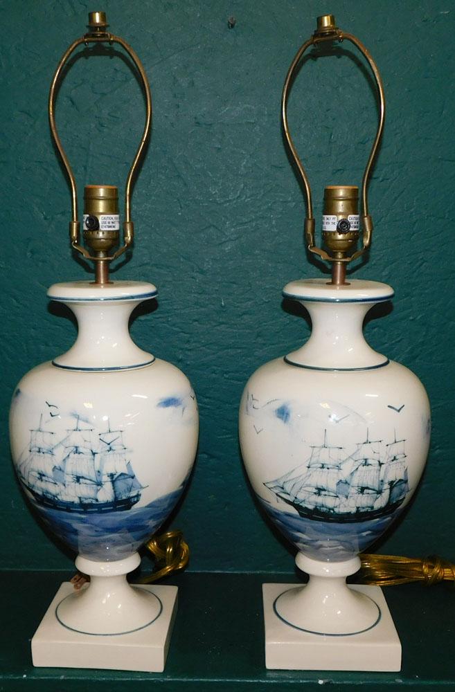 Pair of Porcelain Ship Decorated Lamps: Pair of Porcelain Ship Decorated Lamps . 26" H ALL DESCRIPTIONS AND ANY CONDITION STATEMENT GIVEN BY LANGSTON AUCTION GALLERY ARE STRICTLY OPINIONS AND LANGSTON'S SHALL HAVE NO RESPONSIBILITY FOR ERRO