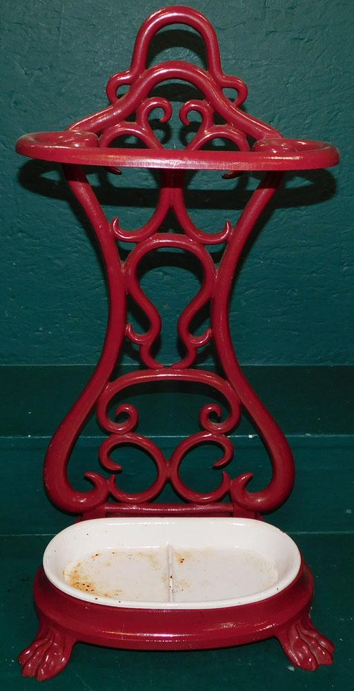 Painted Cast Iron Umbrella Stand: Painted Cast Iron Umbrella Stand . 26" H ALL DESCRIPTIONS AND ANY CONDITION STATEMENT GIVEN BY LANGSTON AUCTION GALLERY ARE STRICTLY OPINIONS AND LANGSTON'S SHALL HAVE NO RESPONSIBILITY FOR ERRORS OR 