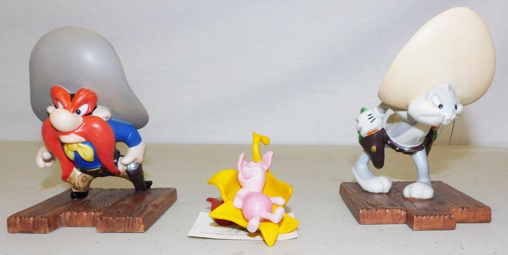 Three Looney Tunes Goebel Figurines: Three Looney Tunes Goebel Figurines. 5" H ALL DESCRIPTIONS AND ANY CONDITION STATEMENT GIVEN BY LANGSTON AUCTION GALLERY ARE STRICTLY OPINIONS AND LANGSTON'S SHALL HAVE NO RESPONSIBILITY FOR ERRORS OR
