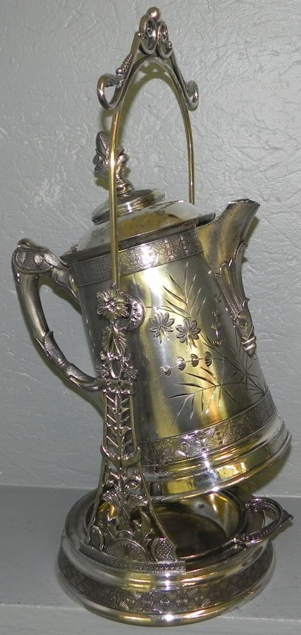 Victorian swinging hot water kettle.: Victorian swinging hot water kettle.