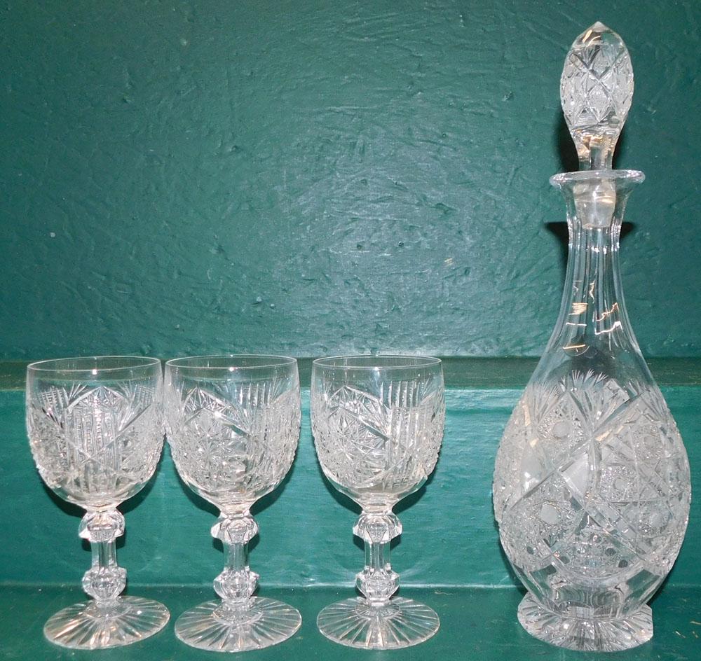 Cut Glass Decanter & Three Wine Glasses: Cut Glass Decanter & Three Wine Glasses. 15" H "ALL DESCRIPTIONS AND ANY CONDITION STATEMENT GIVEN BY LANGSTON AUCTION GALLERY ARE STRICTLY OPINIONS AND LANGSTON'S SHALL HAVE NO RESPONSIBILITY FOR ERR