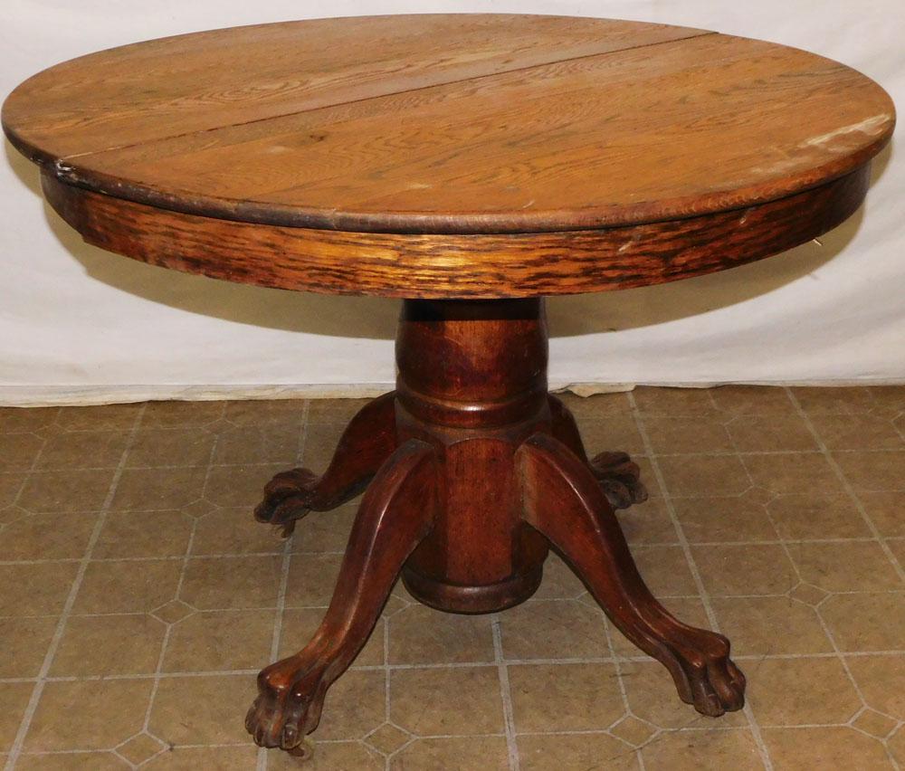 Antique Oak Ball Claw Feet Round Dining Table: Antique Oak Ball Claw Feet Round Dining Table. 40 1/2" Dia 30" H "ALL DESCRIPTIONS AND ANY CONDITION STATEMENT GIVEN BY LANGSTON AUCTION GALLERY ARE STRICTLY OPINIONS AND LANGSTON'S SHALL HAVE NO RESP