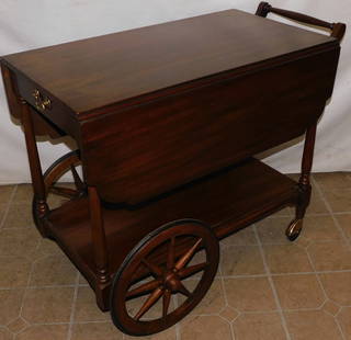 Mahogany Tea Cart with Drawer by Henkel Harris: Mahogany Tea Cart with Drawer by Henkel Harris . 36" W 20 1/2" D 28" H "ALL DESCRIPTIONS AND ANY CONDITION STATEMENT GIVEN BY LANGSTON AUCTION GALLERY ARE STRICTLY OPINIONS AND LANGSTON'S SHALL HAVE N