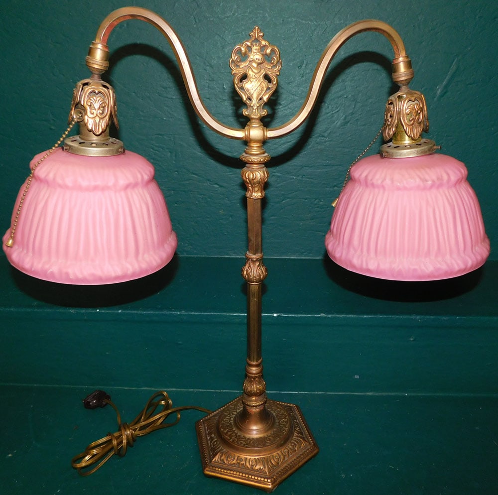 Victorian 2 Light Pink Satin Glass Shade Lamp: Victorian 2 Light Pink Satin Glass Shade Lamp. 22 3/4" H "ALL DESCRIPTIONS AND ANY CONDITION STATEMENT GIVEN BY LANGSTON AUCTION GALLERY ARE STRICTLY OPINIONS AND LANGSTON'S SHALL HAVE NO RESPONSIBILI