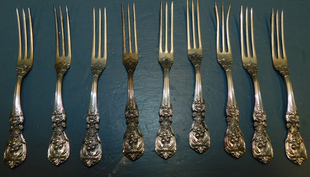9 Sterling Pickle Forks, (4.9 T.O.): 9 Sterling Pickle Forks, (4.9 T.O.). "ALL DESCRIPTIONS AND ANY CONDITION STATEMENT GIVEN BY LANGSTON AUCTION GALLERY ARE STRICTLY OPINIONS AND LANGSTON'S SHALL HAVE NO RESPONSIBILITY FOR ERRORS OR OMI