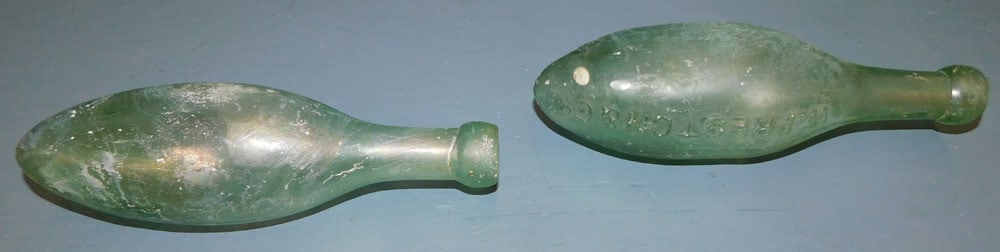19th Century English Glass Soda Bottles: 19th Century English Glass Soda Bottles . 9 1/4" L "ALL DESCRIPTIONS AND ANY CONDITION STATEMENT GIVEN BY LANGSTON AUCTION GALLERY ARE STRICTLY OPINIONS AND LANGSTON'S SHALL HAVE NO RESPONSIBILITY FOR