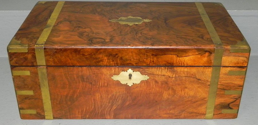 Burl walnut lap desk w/ 2 ink bottles & leath. int.: Burl walnut lap desk with 2 ink bottles and tooled leather interior. 19 3/4" wide x 10 1/4" deep x 7 3/4" tall.