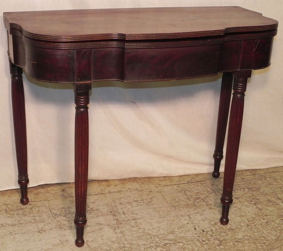 Ant. Sheraton shaped top fold over game table.: Antique Sheraton shaped top fold over game table.