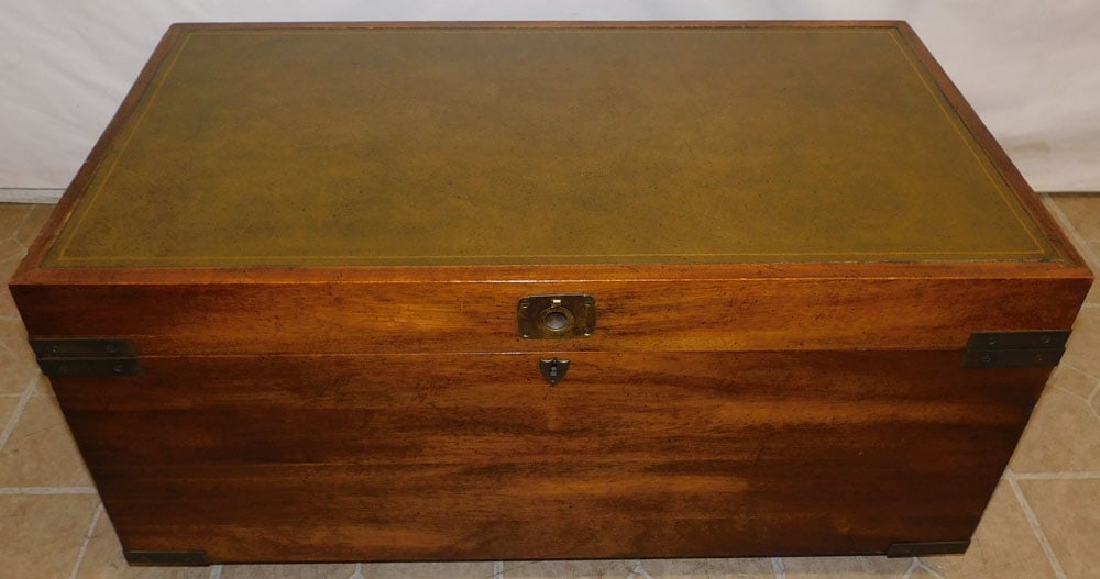 Walnut Campaign Style Metal Bound Coffer: Walnut Campaign Style Metal Bound Coffer . 33" W 18" D 16 1/4" H ALL DESCRIPTIONS AND ANY CONDITION STATEMENT GIVEN BY LANGSTON AUCTION GALLERY ARE STRICTLY OPINIONS AND LANGSTON'S SHALL HAVE NO RESPO