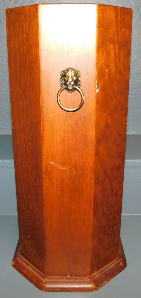 Pine Umbrella Stand with Lion Head Handles: Pine Umbrella Stand with Lion Head Handles . 18" H ALL DESCRIPTIONS AND ANY CONDITION STATEMENT GIVEN BY LANGSTON AUCTION GALLERY ARE STRICTLY OPINIONS AND LANGSTON'S SHALL HAVE NO RESPONSIBILITY FOR 