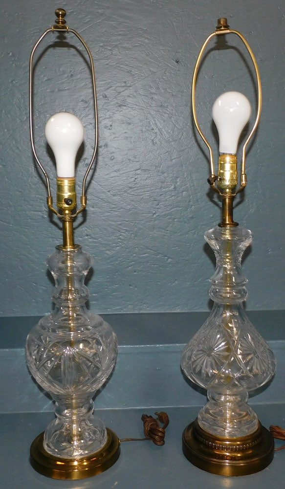 Pair of Cut Glass Lamps: Pair of Cut Glass Lamps. 31 3/4" H ALL DESCRIPTIONS AND ANY CONDITION STATEMENT GIVEN BY LANGSTON AUCTION GALLERY ARE STRICTLY OPINIONS AND LANGSTON'S SHALL HAVE NO RESPONSIBILITY FOR ERRORS OR OMISSI
