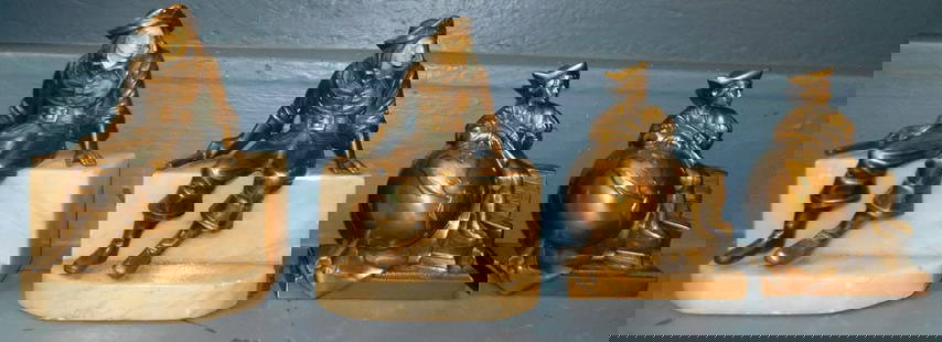 Lot Gilded Metal Bookends & Marble Base Bookends: Lot Gilded Metal Bookends & Marble Base Bookends. 7 1/2" H ALL DESCRIPTIONS AND ANY CONDITION STATEMENT GIVEN BY LANGSTON AUCTION GALLERY ARE STRICTLY OPINIONS AND LANGSTON'S SHALL HAVE NO RESPONSIBIL