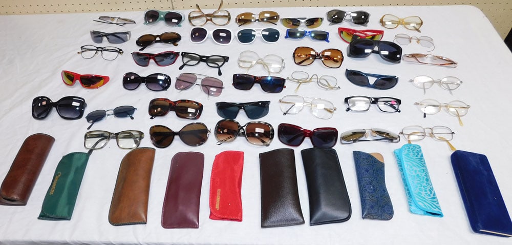 Lot Sunglasses: Lot Sunglasses. ALL DESCRIPTIONS AND ANY CONDITION STATEMENT GIVEN BY LANGSTON AUCTION GALLERY ARE STRICTLY OPINIONS AND LANGSTON'S SHALL HAVE NO RESPONSIBILITY FOR ERRORS OR OMISSIONS. THE ABSENCE OF