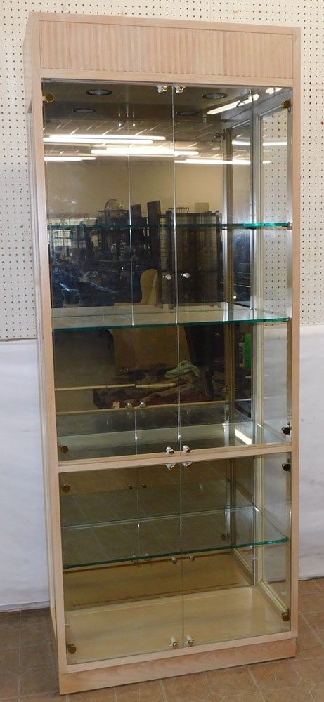 Modern Lighted Curio Cabinet: Modern Lighted Curio Cabinet. 32" W 15" D 82" H ALL DESCRIPTIONS AND ANY CONDITION STATEMENT GIVEN BY LANGSTON AUCTION GALLERY ARE STRICTLY OPINIONS AND LANGSTON'S SHALL HAVE NO RESPONSIBILITY FOR ERR