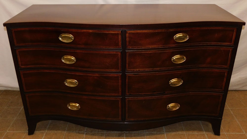 Mahogany Satin Wood Banded Serpentine Front 8 Drawer Desk: Mahogany Satin Wood Banded Serpentine Front 8 Drawer Desk. 57" W 20" D 35" H ALL DESCRIPTIONS AND ANY CONDITION STATEMENT GIVEN BY LANGSTON AUCTION GALLERY ARE STRICTLY OPINIONS AND LANGSTON'S SHALL H