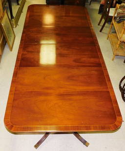 Mahogany Banded Top Two Pedestal Dining Table With Two Leaves By Baker: Mahogany Banded Top Two Pedestal Dining Table With Two Leaves By Baker. 108" W 46" D 27 1/2" H ALL DESCRIPTIONS AND ANY CONDITION STATEMENT GIVEN BY LANGSTON AUCTION GALLERY ARE STRICTLY OPINIONS AND