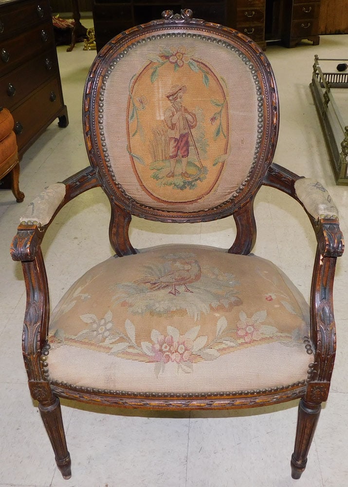 Antique French Walnut Carved Arm Chair With Tapestry Upholstery: Antique French Walnut Carved Arm Chair With Tapestry Upholstery. 36" H ALL DESCRIPTIONS AND ANY CONDITION STATEMENT GIVEN BY LANGSTON AUCTION GALLERY ARE STRICTLY OPINIONS AND LANGSTON'S SHALL HAVE NO