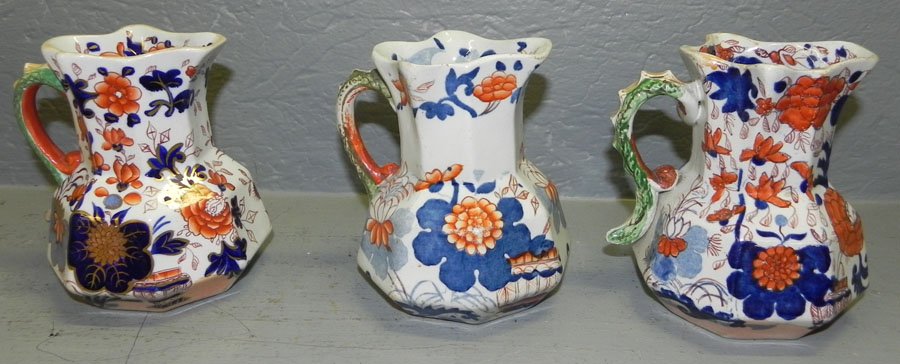 3 unsigned masons ironstone decorated pitchers: (3) Unsigned Mason's Ironstone decorated pitchers. 5 1/4" tall.