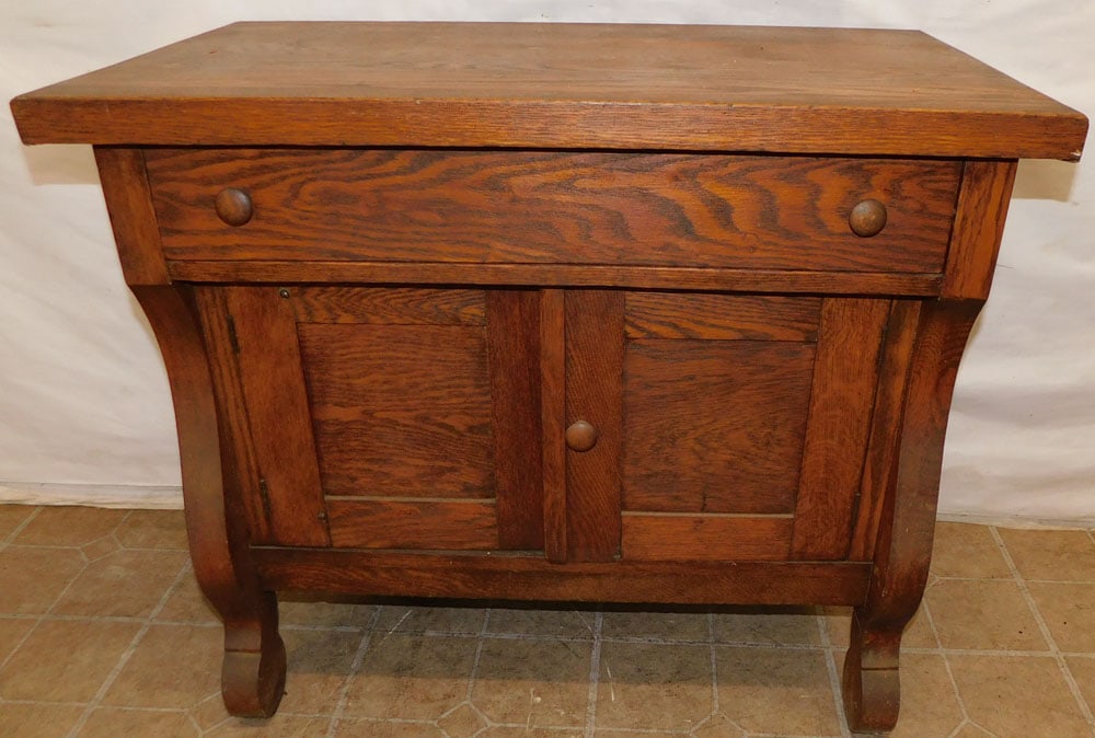 Antique Oak Washstand: Antique Oak Washstand . 33 1/2" W 19 1/2" D 29" H ALL DESCRIPTIONS AND ANY CONDITION STATEMENT GIVEN BY LANGSTON AUCTION GALLERY ARE STRICTLY OPINIONS AND LANGSTON'S SHALL HAVE NO RESPONSIBILITY FOR E