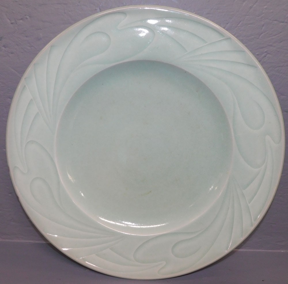 Celadon Porcelain Charger: Celadon Porcelain Charger . 17 1/2" Dia. ALL DESCRIPTIONS AND ANY CONDITION STATEMENT GIVEN BY LANGSTON AUCTION GALLERY ARE STRICTLY OPINIONS AND LANGSTON'S SHALL HAVE NO RESPONSIBILITY FOR ERRORS OR