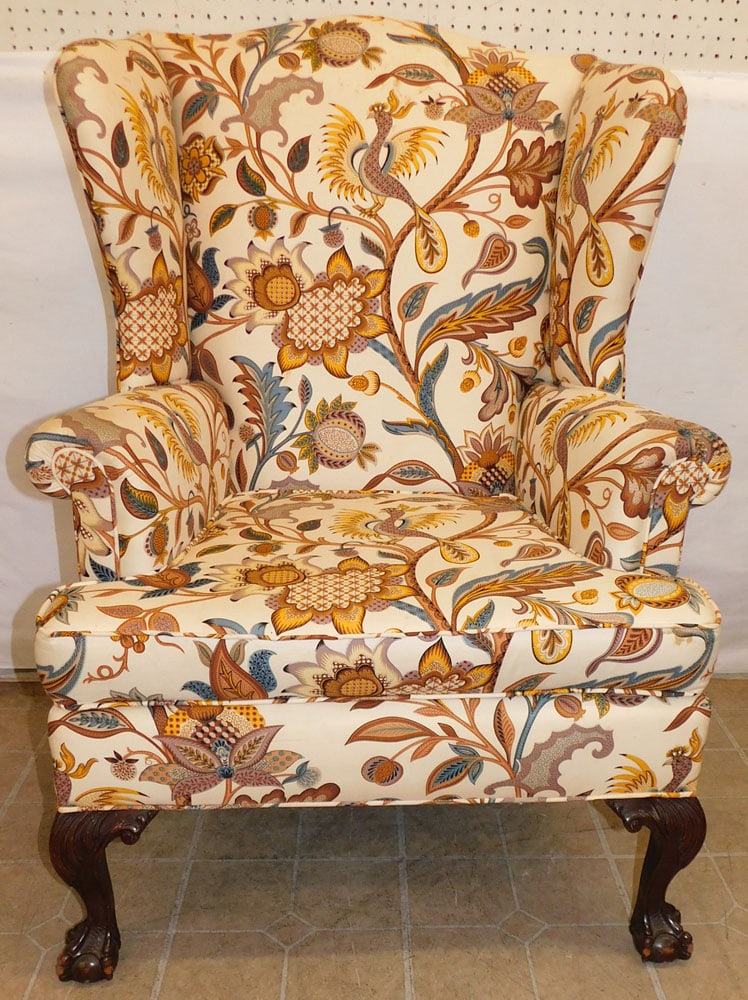 Upholstered Wing Back Chair With Mahogany Carved Claw Feet: Upholstered Wing Back Chair With Mahogany Carved Claw Feet. 45 1/4" HALL DESCRIPTIONS AND ANY CONDITION STATEMENT GIVEN BY LANGSTON AUCTION GALLERY ARE STRICTLY OPINIONS AND LANGSTON'S SHALL HAVE NO R