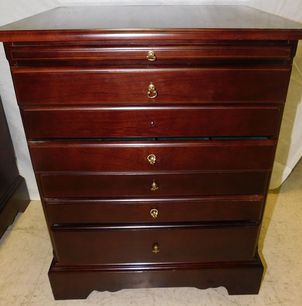 Mahogany Jewelry Cabinet With Pull Out Slide By Bombay: Mahogany Jewelry Cabinet With Pull Out Slide By Bombay . 19 3/4" W 15" D 25 1/2" H ALL DESCRIPTIONS AND ANY CONDITION STATEMENT GIVEN BY LANGSTON AUCTION GALLERY ARE STRICTLY OPINIONS AND LANGSTON'S S