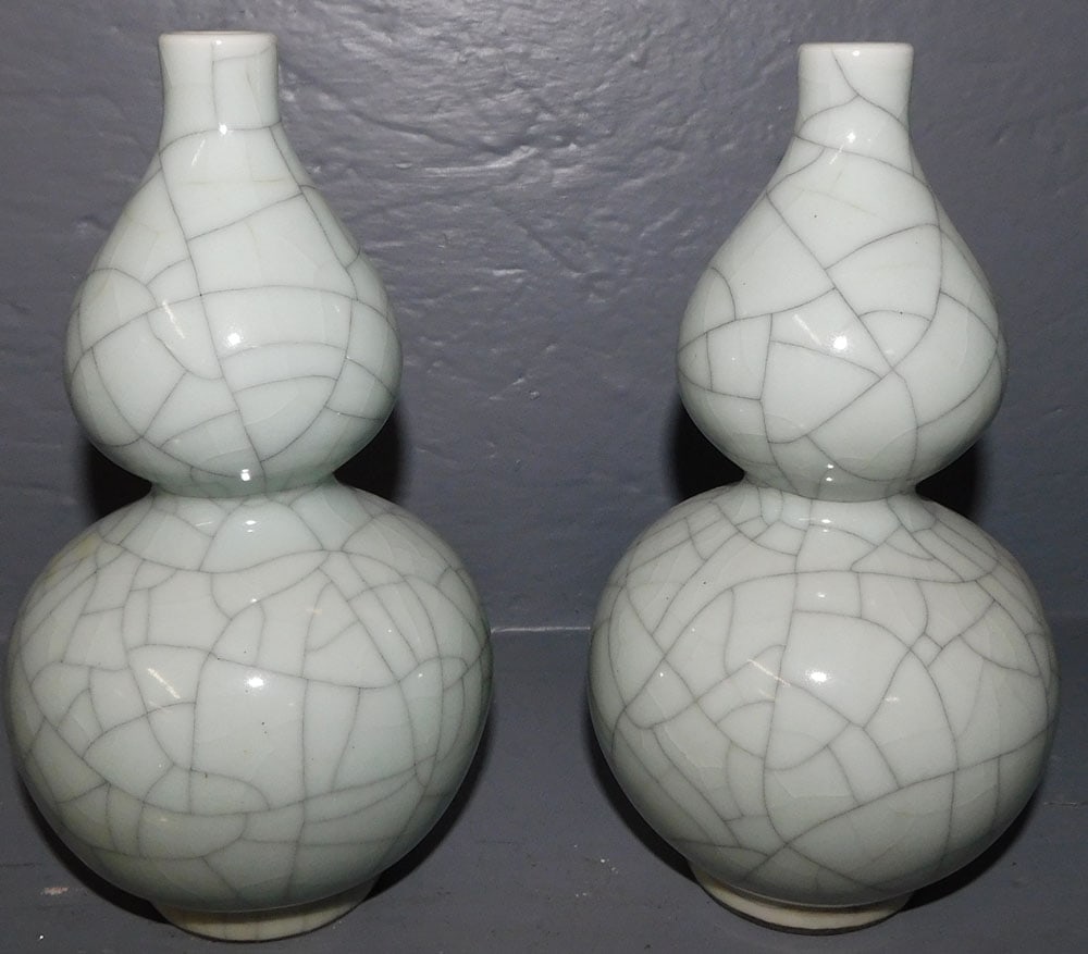 Pair of Celadon Crackleware Gourd Vases: Pair of Celadon Crackleware Gourd Vases. 8 1/4" H ALL DESCRIPTIONS AND ANY CONDITION STATEMENT GIVEN BY LANGSTON AUCTION GALLERY ARE STRICTLY OPINIONS AND LANGSTON'S SHALL HAVE NO RESPONSIBILITY FOR E