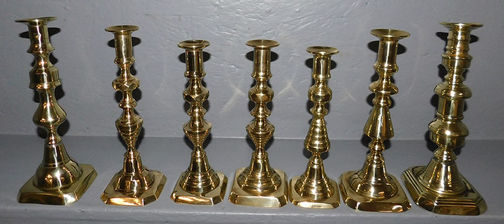 Lot 7 Antique Brass Push-Up Candlesticks (1 of 2)