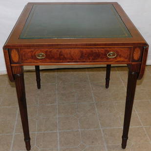 Mahogany Drop Leaf & Tooled Leather Top Game Table by Schmieg & Kotzian: Mahogany Drop Leaf & Tooled Leather Top Game Table by Schmieg & Kotzian. 28" W 30 1/4" D 30" H ALL DESCRIPTIONS AND ANY CONDITION STATEMENT GIVEN BY LANGSTON AUCTION GALLERY ARE STRICTLY OPINIONS AND