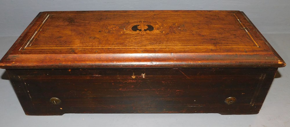 Antique Rosewood Inlaid Swiss Music Box, (Working): Antique Rosewood Inlaid Swiss Music Box, (Working). 20" W 8 1/2" D 6" H ALL DESCRIPTIONS AND ANY CONDITION STATEMENT GIVEN BY LANGSTON AUCTION GALLERY ARE STRICTLY OPINIONS AND LANGSTON'S SHALL HAVE N
